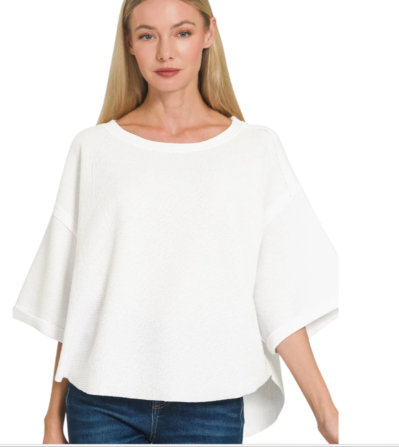 Double knit exposed seam curved hem short sleeve top